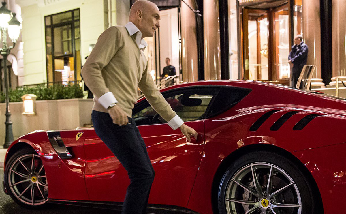 Markus Lehner getting into his Ferrari on Monte Carlo Casino square